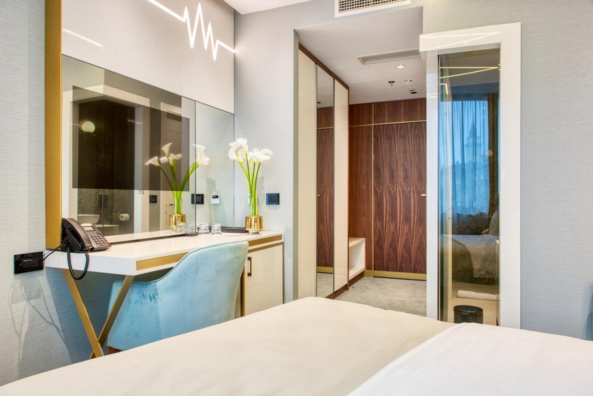 Hotel Pupin โนวีซาด ภายนอก รูปภาพ A room at the hotel